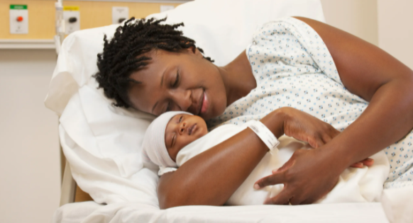 BLACK WOMAN CURED OF FIBROID NEW BORN